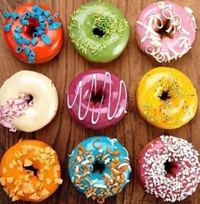 2-Piece Set of Silicone Donut Baking Molds: red, green donuts, colorful decorative food presentation style