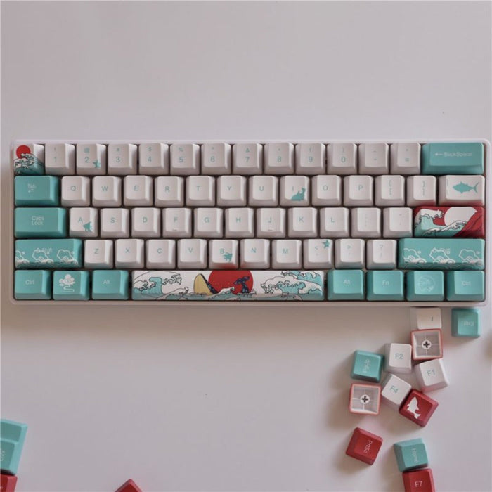 4-Piece Keycap Set with Animated Design: white, teal ocean waves, red sun, whale, surfboard, cartoon Japanese wave-art inspir