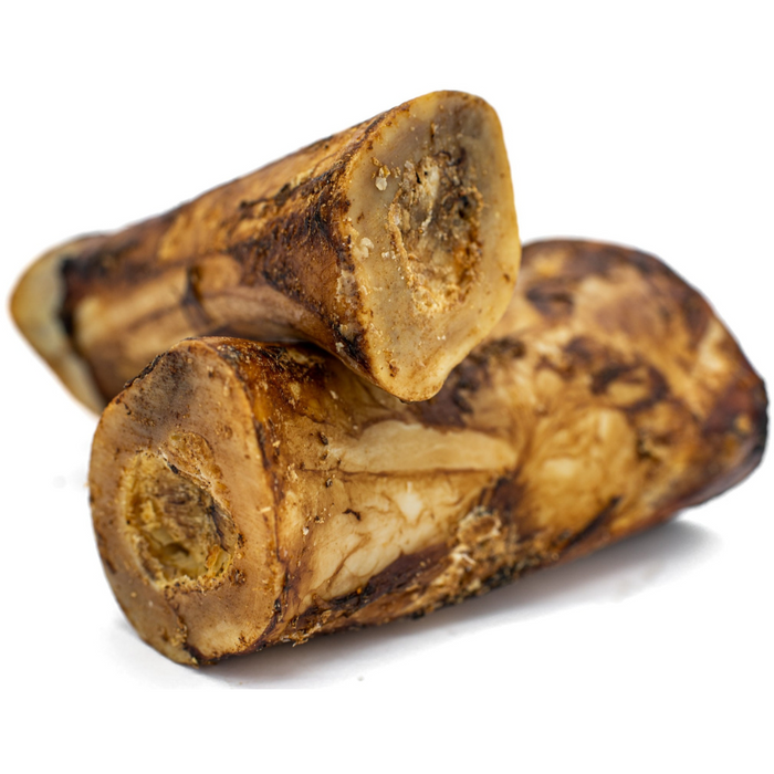 Dog chewing beef marrow bone - long-lasting single-ingredient chew | Ombrava