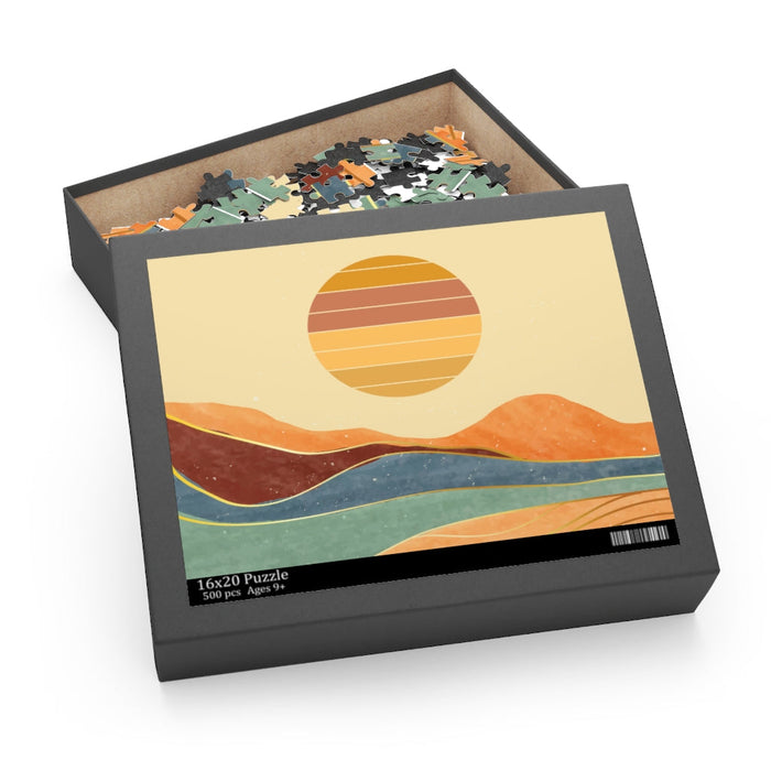 500-Piece Puzzle Featuring Artwork of a Desert Terrain: beige, orange stylized landscape with sun, hills, and layered terrain