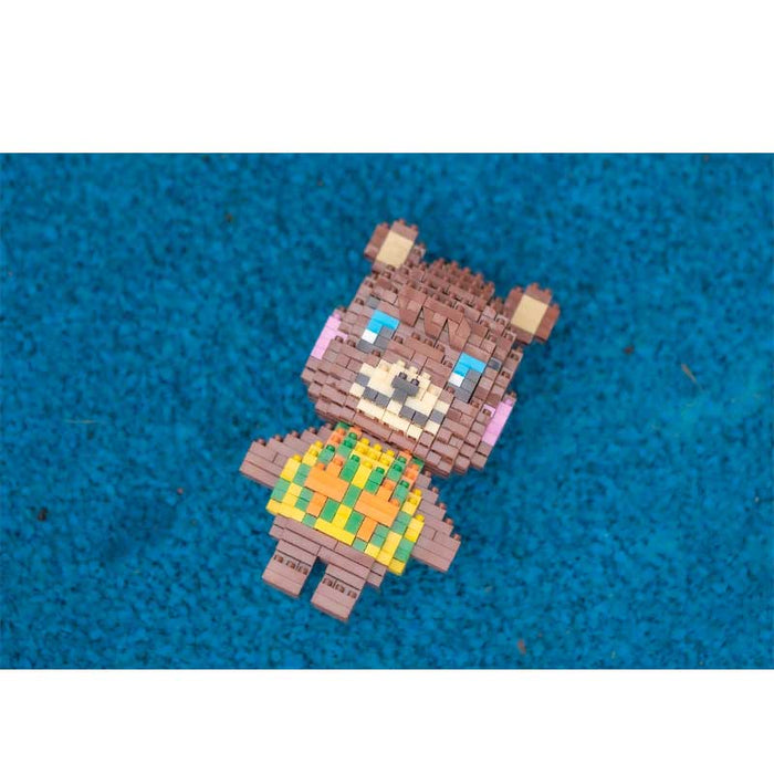 ACNH Building Blocks Miniature Toy Gift: yellow, blue cartoon animal character resembling a rabbit, pixel art, cartoon style