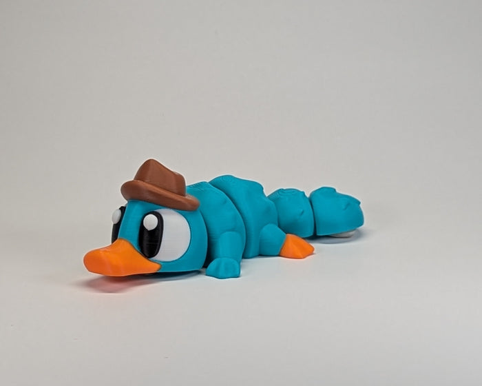 Agent P - Platypus laying down looking left