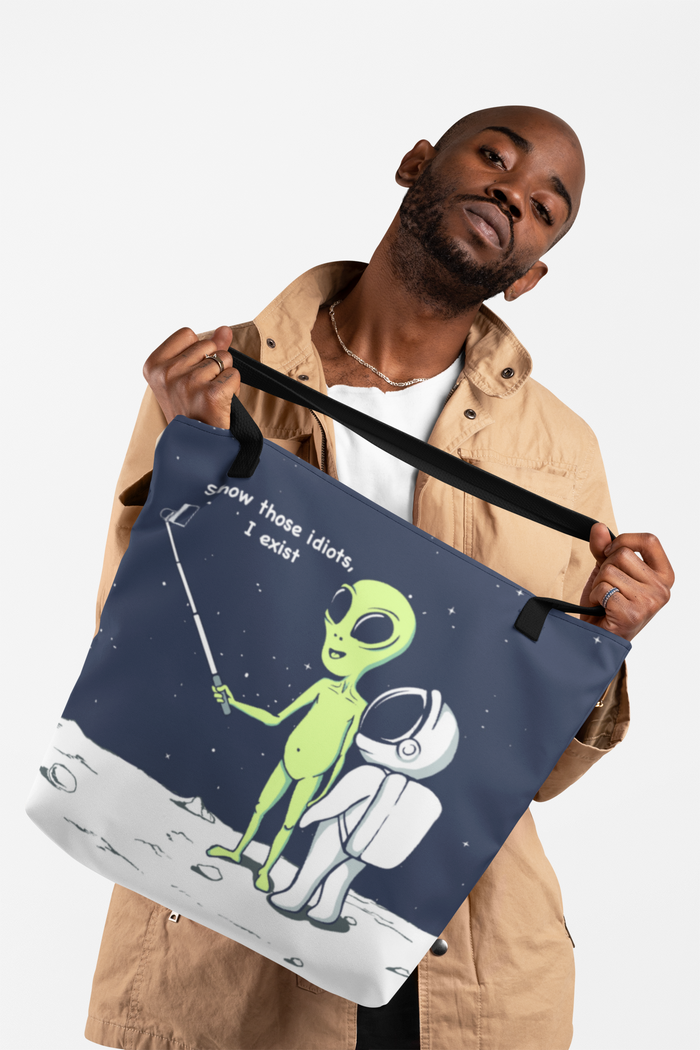 Alien Comedy: Proving My Existence Tote Bag (Medium): black, dark navy blue green alien and astronaut on a moon-like surface