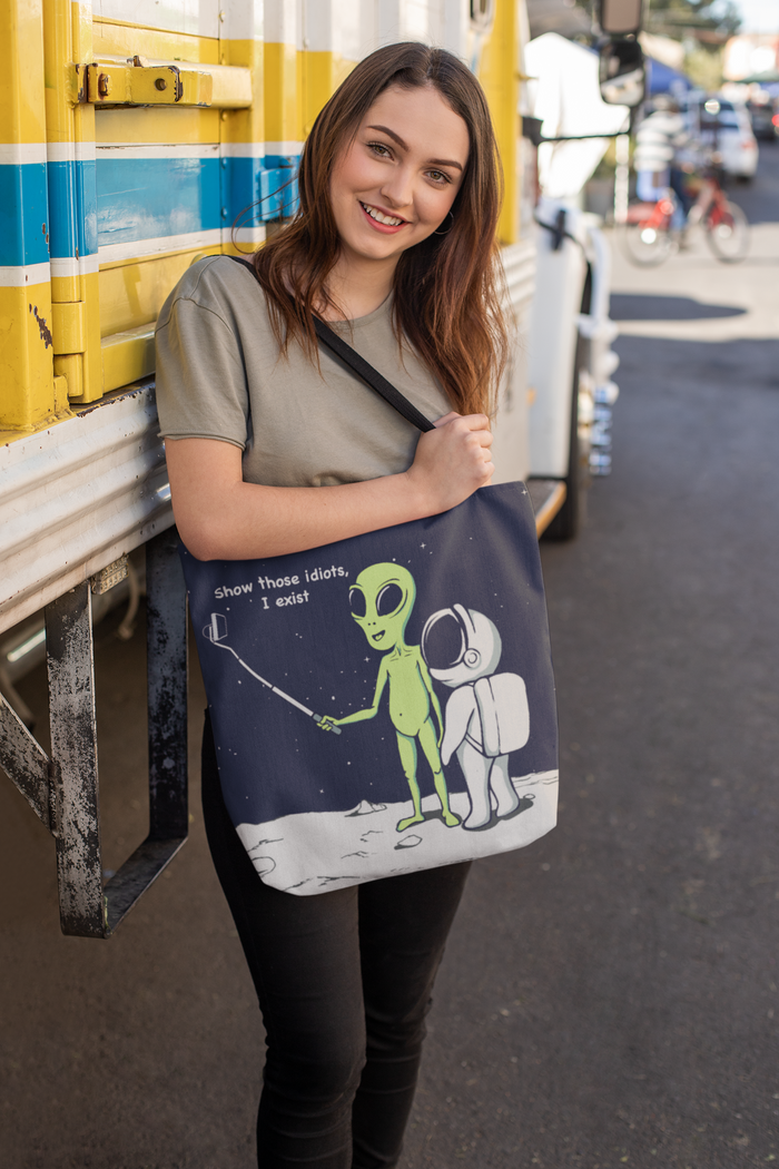 Alien Comedy: Proving My Existence Tote Bag (Medium): black, dark navy blue green alien and astronaut on a moon-like surface