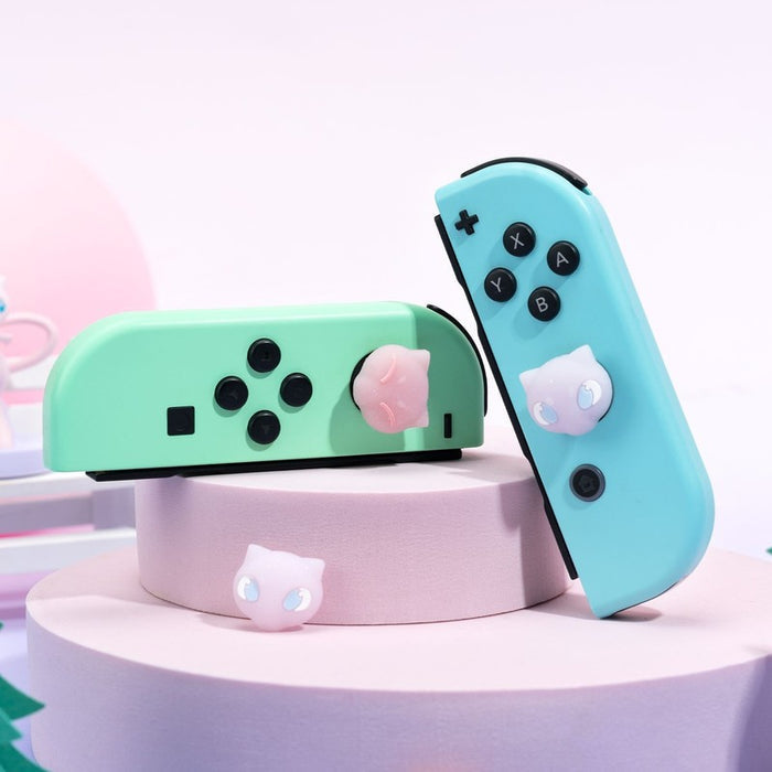 Anime-themed Switch joystick caps for gamers: mint green, turquoise blue cat-themed, kawaii style