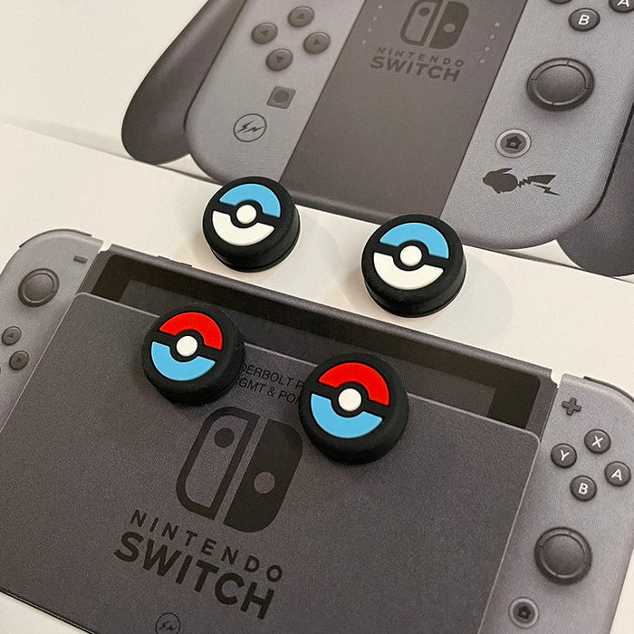 Ball Switch Thumb Grips for Nintendo Switch: black, red Poké Ball theme, cartoon gaming accessory style