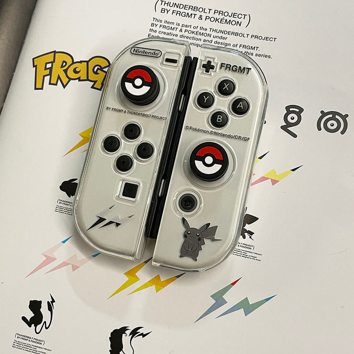 Ball Switch Thumb Grips for Nintendo Switch: black, red Poké Ball theme, cartoon gaming accessory style