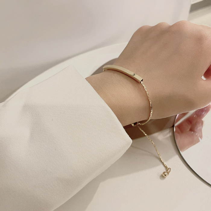Bar-accented Women's Knot Bracelet: gold, cream bracelet, minimal style