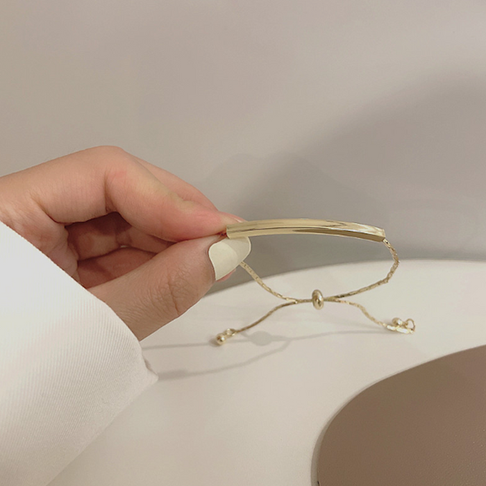 Bar-accented Women's Knot Bracelet: gold, cream bracelet, minimal style