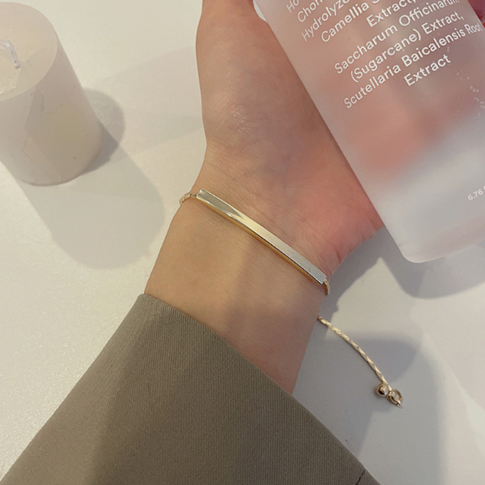 Bar-accented Women's Knot Bracelet: gold, cream bracelet, minimal style
