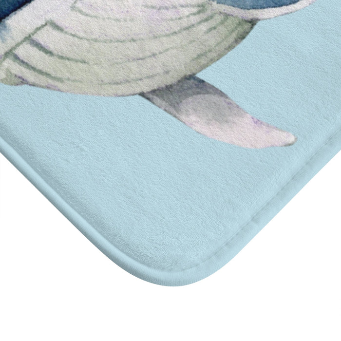 Bath Mat Featuring the Majestic Humpback Whale: light blue, dark blue whale, watercolor cartoon style