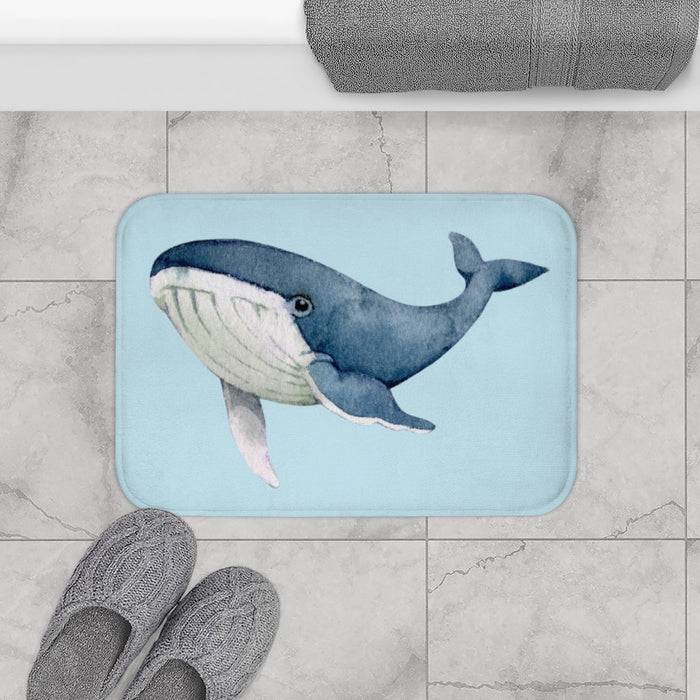 Bath Mat Featuring the Majestic Humpback Whale: light blue, dark blue whale, watercolor cartoon style