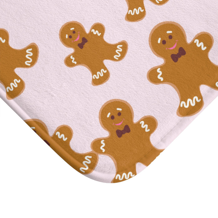 Bath Mat with Gingerbread Cookies Motif: light pink, brown gingerbread people, cartoon, kawaii style