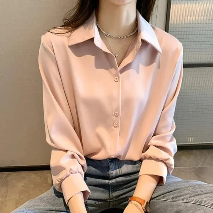 Button-Up Blouse for Women's Business Attire: light peach pink button-up blouse, minimal style