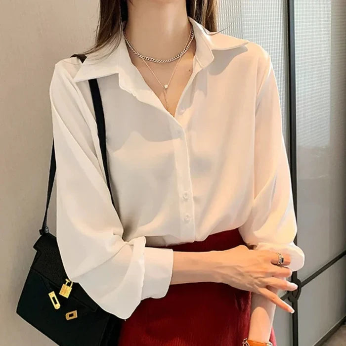 Button-Up Blouse for Women's Business Attire: light peach pink button-up blouse, minimal style