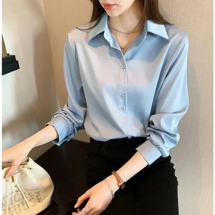 Button-Up Blouse for Women's Business Attire: light peach pink button-up blouse, minimal style