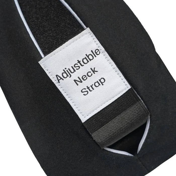 Black adjustable neck strap with white text and elastic band on the back of cabeau evolution x memory foam neck pillow for preferred fit