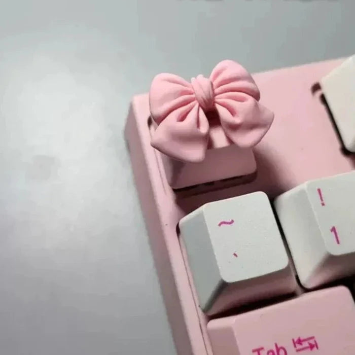 Cartoonish Pink Keycap Design: white, yellow-orange rabbit sitting on a moon, kawaii style