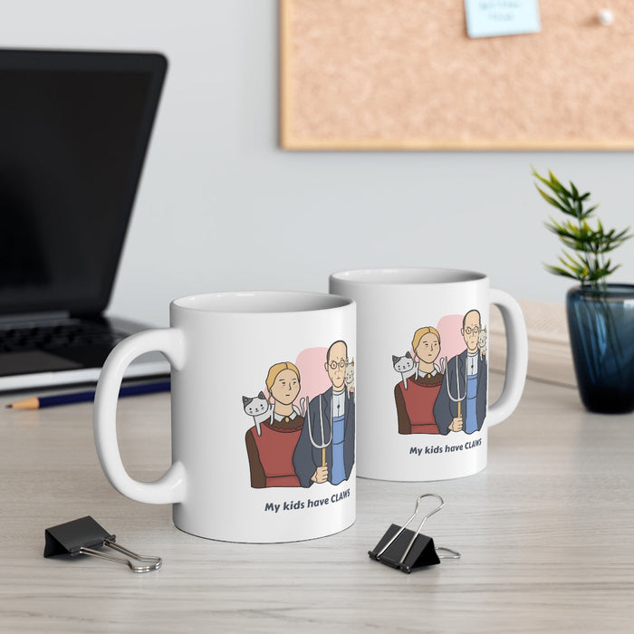 Cat Novelty Mug: My Children Possess Claws: white, gray cartoon couple with two cats