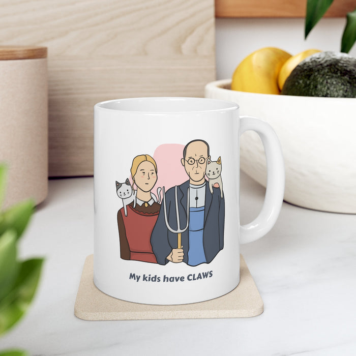 Cat Novelty Mug: My Children Possess Claws: white, gray cartoon couple with two cats