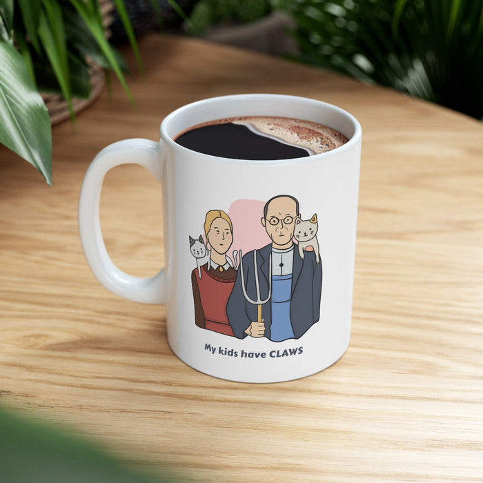 Cat Novelty Mug: My Children Possess Claws: white, gray cartoon couple with two cats