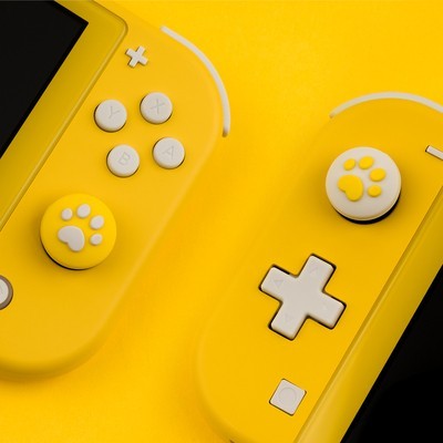 Cat Paw Joystick Caps for Switch: yellow, white animal paw theme, cartoon kawaii style