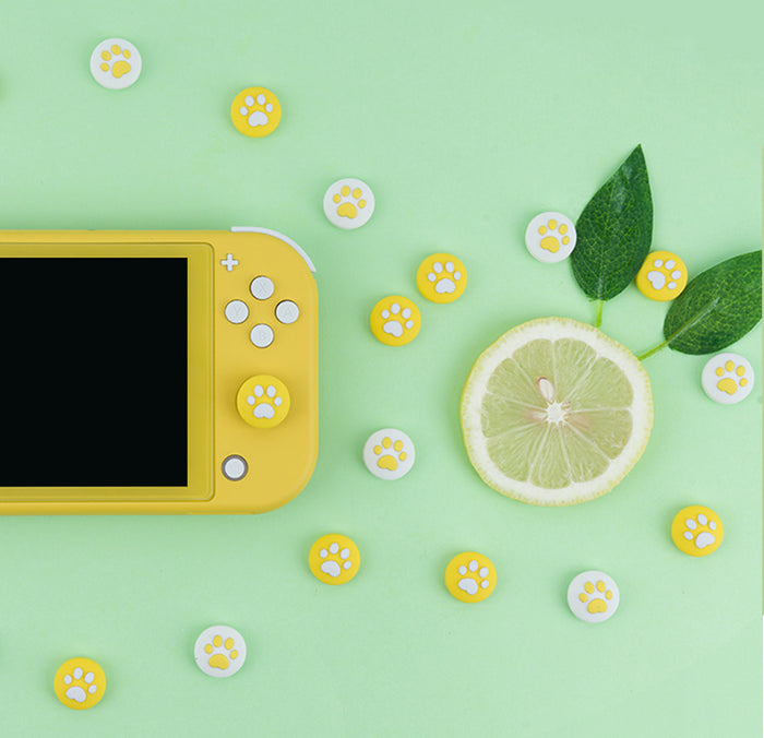 Cat Paw Joystick Caps for Switch: yellow, white animal paw theme, cartoon kawaii style