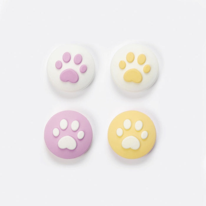 Cat Paw Switch Thumb Grips: turquoise, white animal paw print, minimal cartoon style