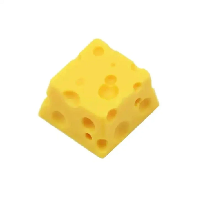 Cheese-Inspired ESC Keycap Design: black, yellow cheese, playful novelty style