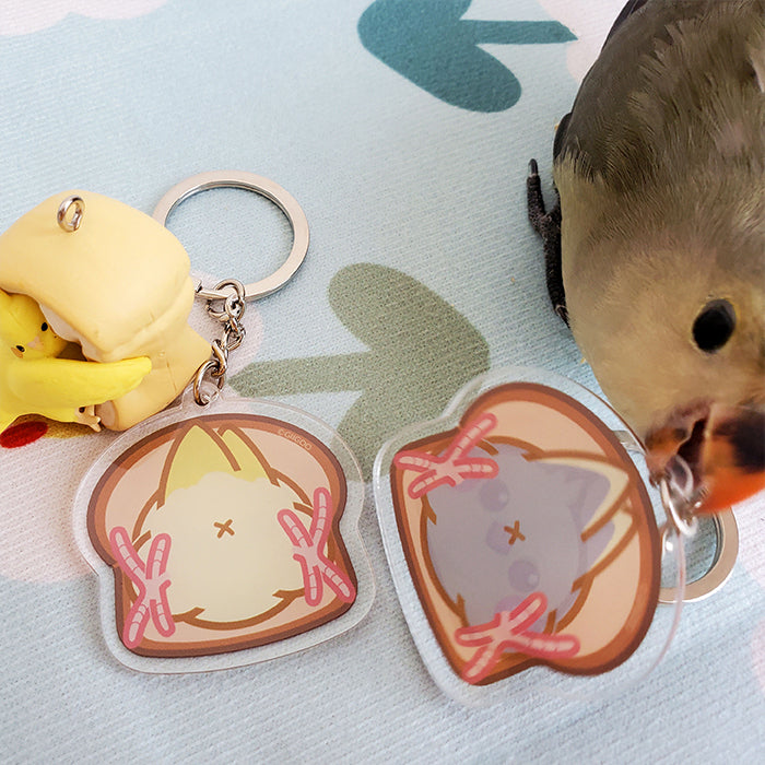 Cockatiel Key Rings with Cute Design: yellow, pink cartoon bird/chick characters, kawaii cartoon style
