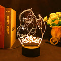 Color-Changing Bedroom Light with Remote Control: warm yellow-orange light, black Charizard Pokémon character, cartoon style