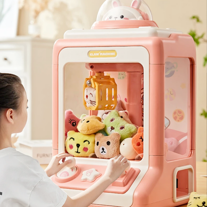 Compact Animated Entertainment Claw Game Device: pink, white cute animal characters, kawaii cartoon style