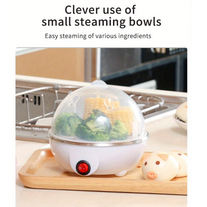 Compact Egg Cooker and Food Steamer: silver, white steaming basket with round buns, minimal food photography style
