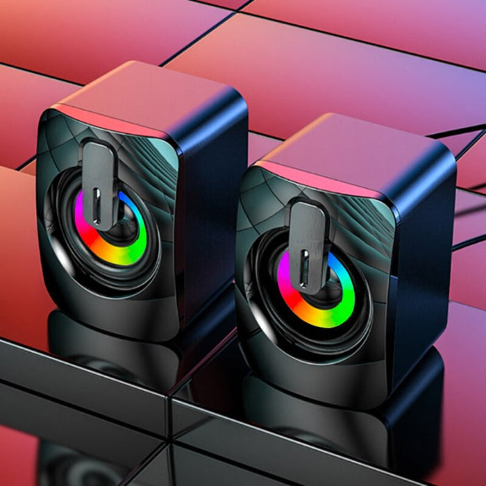Compact RGB PC Speaker: black, dark blue pair of compact speakers, futuristic gaming style