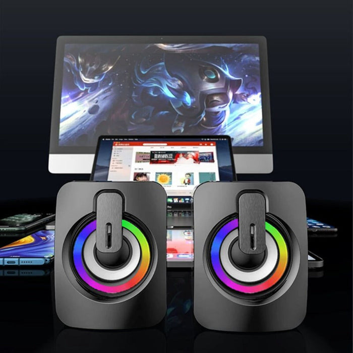 Compact RGB PC Speaker: black, dark blue pair of compact speakers, futuristic gaming style