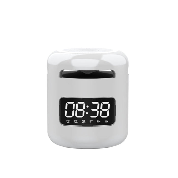 Compact Wireless Speaker with Built-in FM Radio and Alarm Clock: black, silver Bluetooth speaker/alarm clock device, modern m