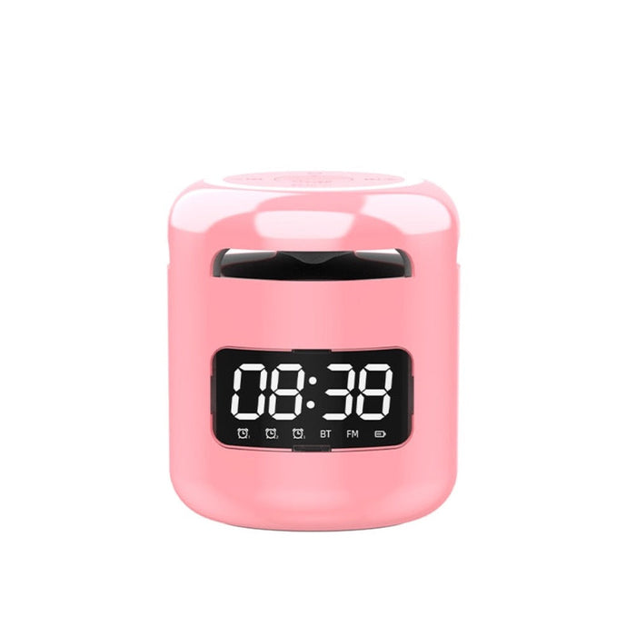 Compact Wireless Speaker with Built-in FM Radio and Alarm Clock: black, silver Bluetooth speaker/alarm clock device, modern m