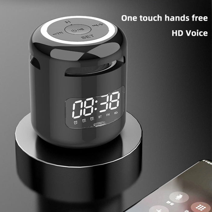 Compact Wireless Speaker with Built-in FM Radio and Alarm Clock: black, silver Bluetooth speaker/alarm clock device, modern m
