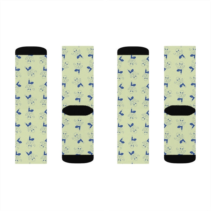Cosmic Yoga Footwear: light olive green, blue small cartoon animal-like figures, cartoon patterned style