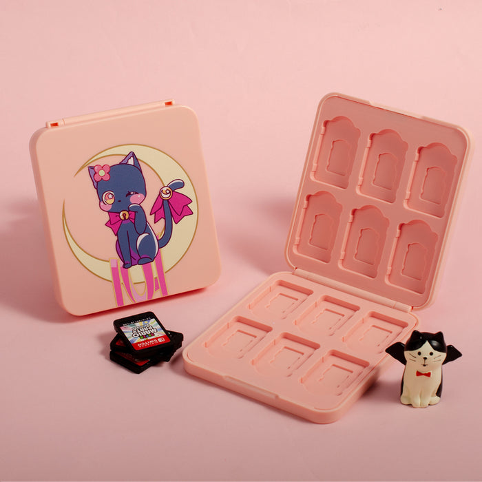 Cute and Protective Switch Game Case: light pink, dark blue cartoon cat character, kawaii cartoon style