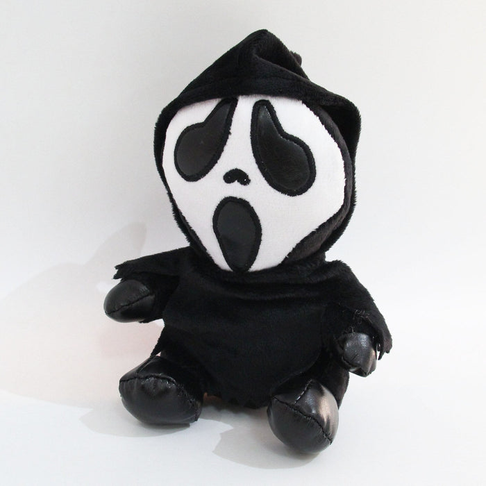 Cute and Spooky Ghoulie Plush Toy: black, white Ghostface-style masked horror character, cartoon plush style