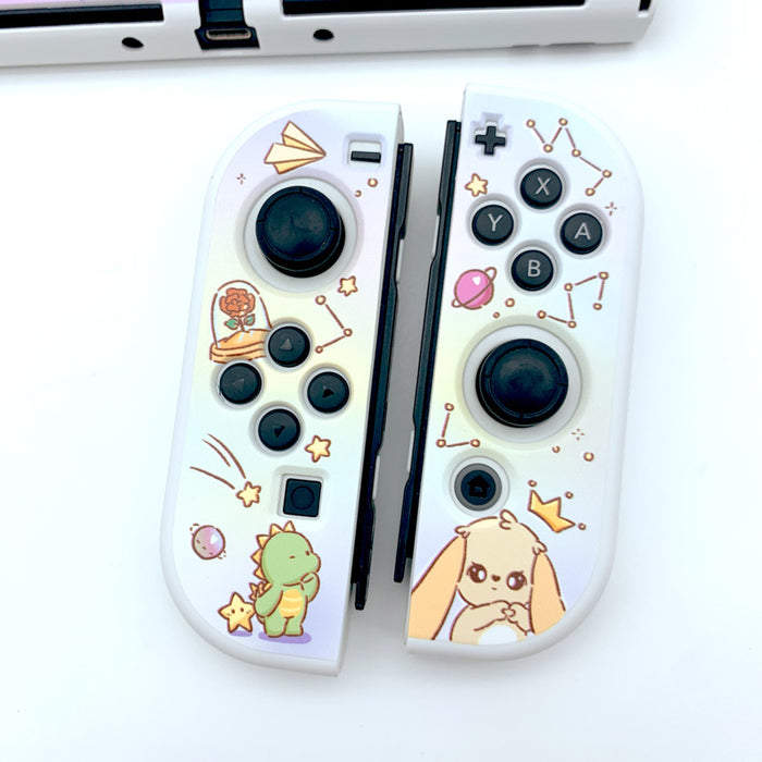 Cute Animal Switch OLED Cover Case: white, pastel purple cartoon creatures and space theme, kawaii cartoon style