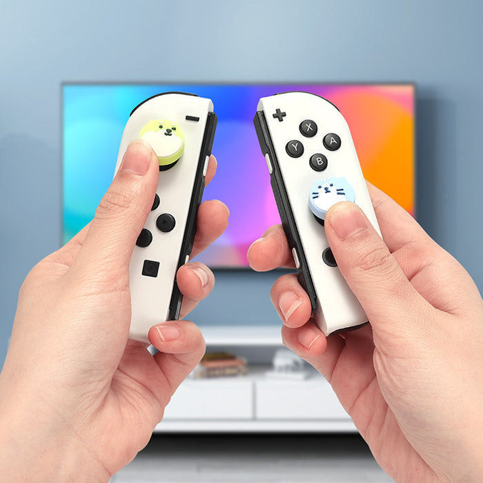Cute Cat and Dog Switch Thumb Grips: white, black cute cat characters, kawaii cartoon style