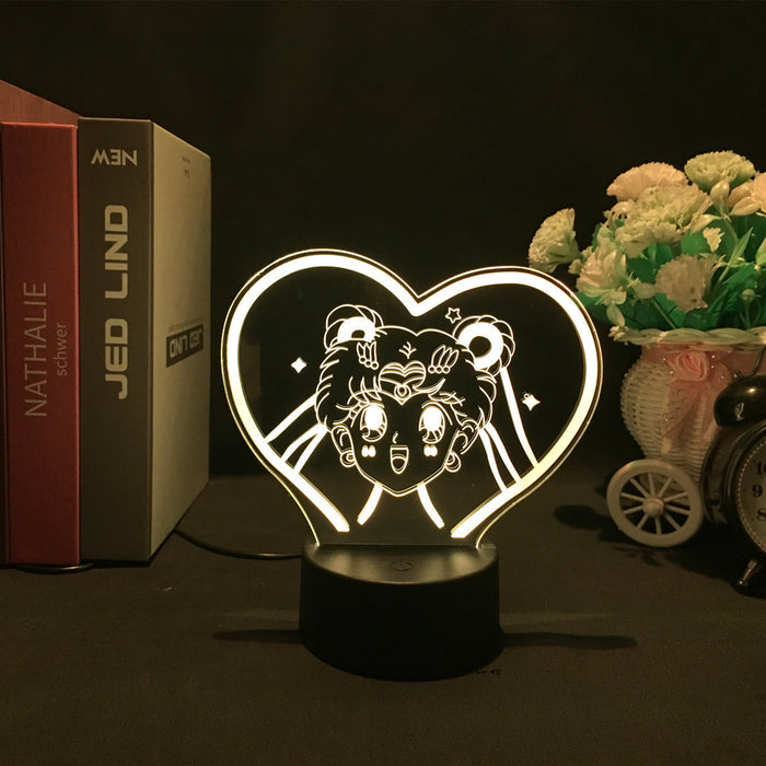 Cute LED Light with 16 Colors: yellow-green glow, clear acrylic Sailor Moon character, cartoon anime line art style