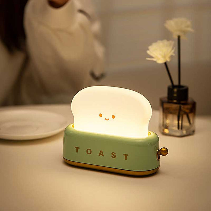 Cute Toaster Night Light with Adjustable Brightness: cream white, light green smiling toast slice, kawaii cartoon style