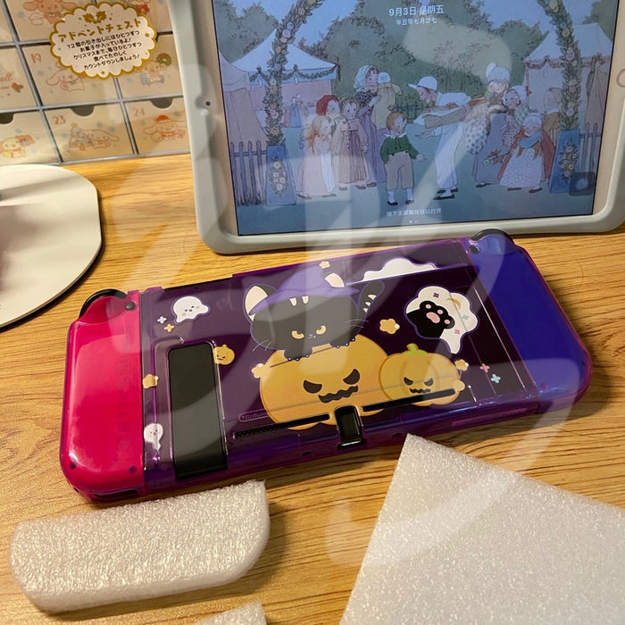 Cute Witchy Cat Nintendo Switch Case: transparent purple, pink black cat wearing a witch hat with Halloween pumpkin theme, ka