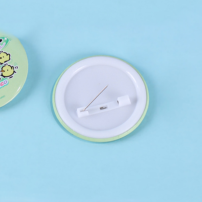 Enchanting Official Badge Pin Set Collection: light blue, teal blue cartoon creature with a red companion, kawaii cartoon sty