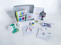 STEM-focused play and learn kit for kids aged 3-6. Includes a battery-free snap circuit, Lego playdough cutter with homemade playdough, straw STEM activity, Robot Suncatcher, Lego pieces, Lego educational cards, and 'The ABC's of Engineering' board book. Comes with a brochure containing additional activities and instructions.