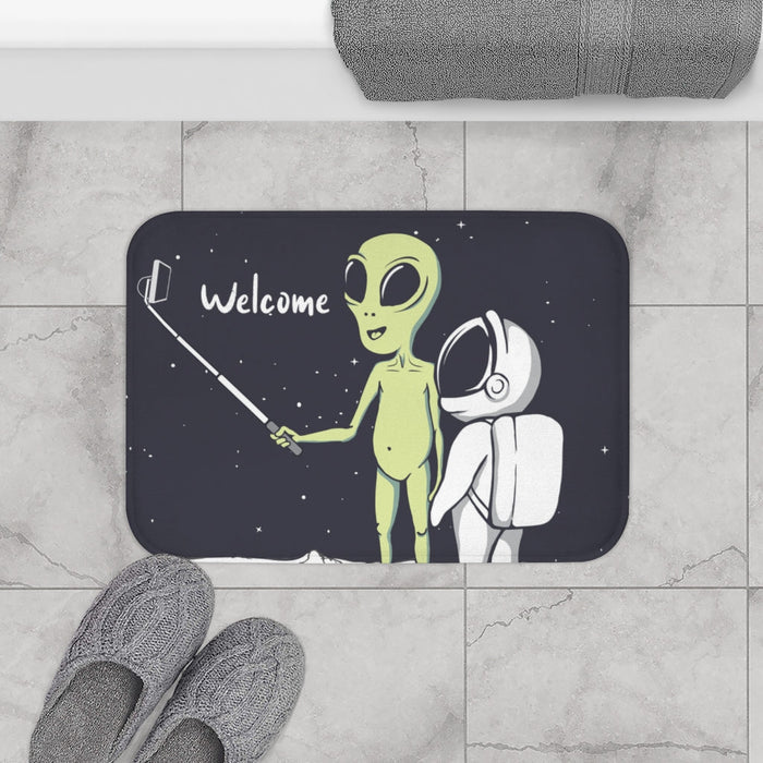Extraterrestrial Snapping Self-Portrait Bath Mat: dark navy, black green alien and astronaut, cartoon, retro sci-fi style