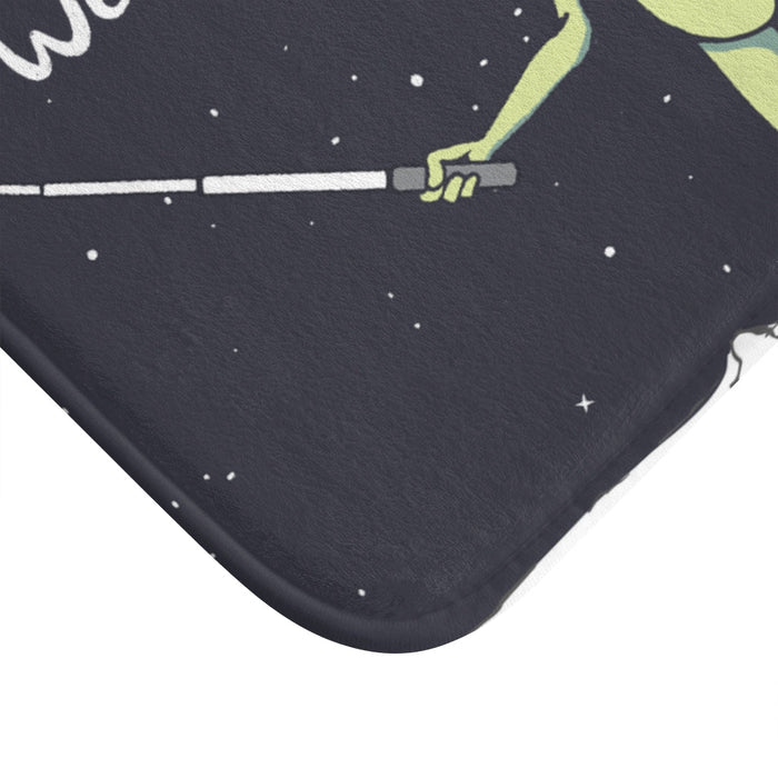 Extraterrestrial Snapping Self-Portrait Bath Mat: dark navy, black green alien and astronaut, cartoon, retro sci-fi style